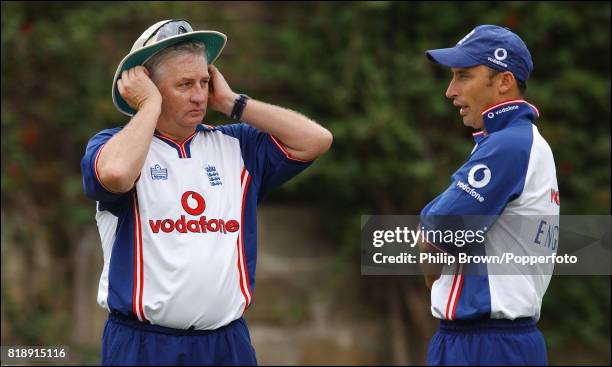 England captain Nasser Hussain talks with team coach Duncan Fletcher during a training session at the Sydney Cricket Ground before the 5th Test match...