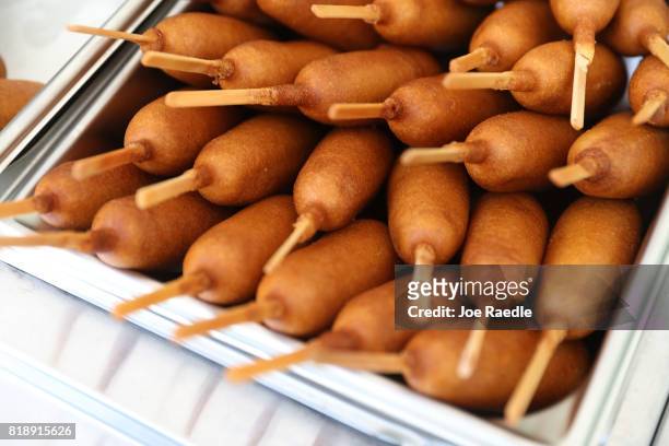 Corn dogs are ready to be eaten during the American Meat Institute's annual Hot Dog Lunch in the Rayburn courtyard on July 19, 2017 in Washington,...