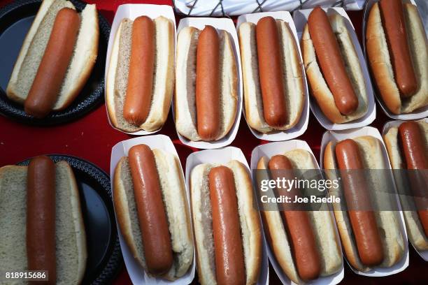 Hot dogs are on ready to be eaten during the American Meat Institute's annual Hot Dog Lunch in the Rayburn courtyard on July 19, 2017 in Washington,...