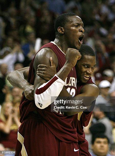 Florida State's Toney Douglas celebrates with Al Thornton after Thornton hit his second free-throw in the final 1.5 seconds to give the Seminoles a...