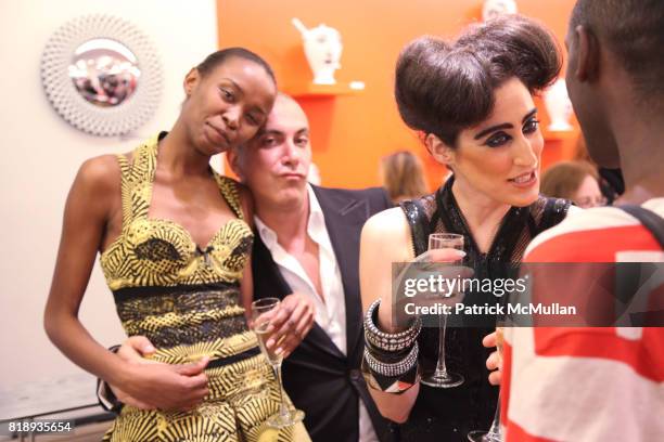 Guest, Liborio Capizzi and Ladyfag attend BARNEYS NEW YORK Celebrates FORNASETTI at Barneys on May 14, 2010 in New York City.