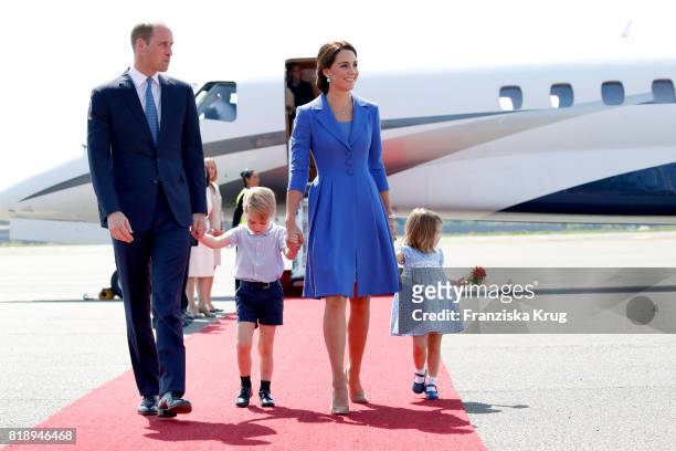 Prince William, Duke of Cambridge, Catherine, Duchess of Cambridge, Prince George of Cambridge and Princess Charlotte of Cambridge arrive at Berlin...