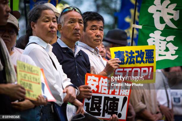 Anti-Abe protesters gather in front of the Tokyo parliament to protest against the policies of Shinzo Abe and to call on the Japanese prime minister...