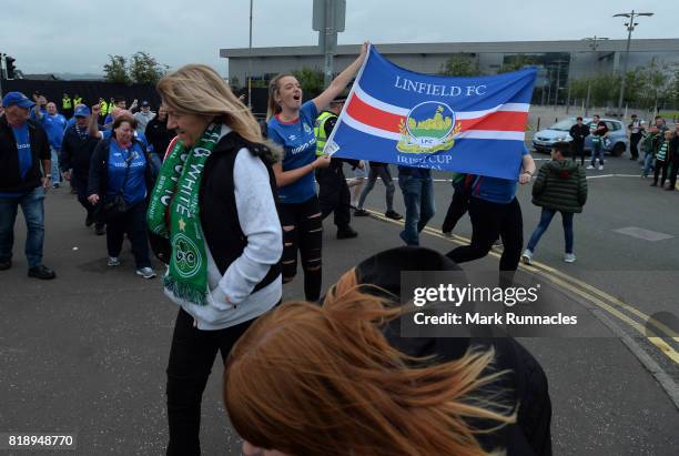 Linfield fans arrive at Celtic Park ahead of the UEFA Champions League Qualifying Second Round, Second Leg match between Celtic and Linfield at...
