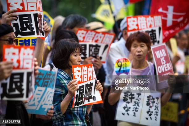 Anti-Abe protesters gather in front of the Tokyo parliament to protest against the policies of Shinzo Abe and to call on the Japanese prime minister...