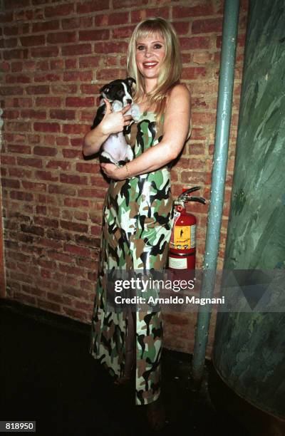 Cindy Guyer, the female "Fabio" of romance novel covers, attends a party March 15, 2001 to support the Animal Haven animal shelter at the Chelsea...
