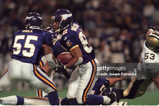 Running back Robert Smith of the Minnesota Vikings runs upfield against the New Orleans Saints in the 2000 NFC Divisional Playoff Game at the...