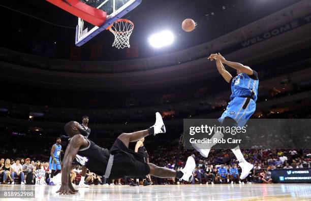 Jerome Williams of Power shoots against Ivan Johnson of the Ghost Ballers during week four of the BIG3 three on three basketball league at Wells...