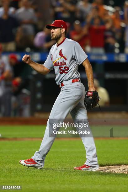 Michael Wacha of the St. Louis Cardinals pumps his fist after pitching a complete game 5-0 shutout against the New York Mets at Citi Field on July...