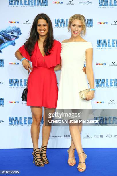 July 19: Rabeah Rahimi and Julia Dietze attend the German premiere of the 'Valerian - Die Stadt der Tausend Planeten' at CineStar on July 19, 2017 in...