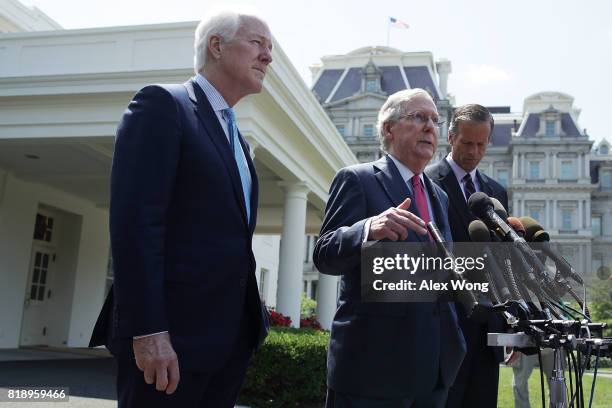 Senate Majority Leader Sen. Mitch McConnell speaks to members of the media as Senate Majority Whip Sen. John Cornyn and Sen. John Thune look on...