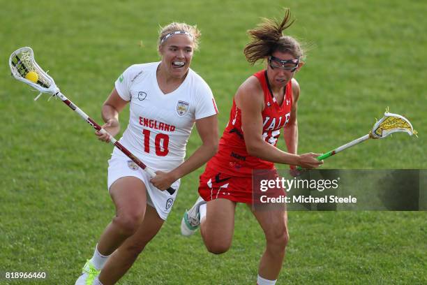 Annie Hillier of England is chased by Amy Martin of Wales during the quarter final match between England and Wales during the 2017 FIL Rathbones...