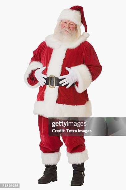 santa claus with hands on belly - santa stock-fotos und bilder