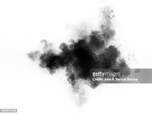 forms and textures of an explosion of a powder of color black on a  white background - black smoke stock pictures, royalty-free photos & images