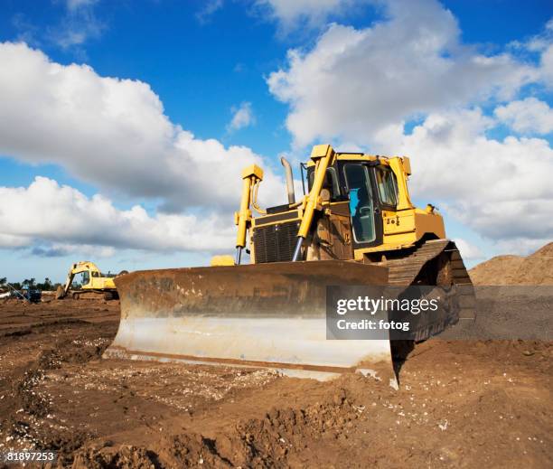 heavy construction equipment - raupe stock-fotos und bilder