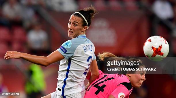 England's defender Lucia Bronze and Scotland's defender Rachel Corsie go for a header during the UEFA Women's Euro 2017 football tournament match...