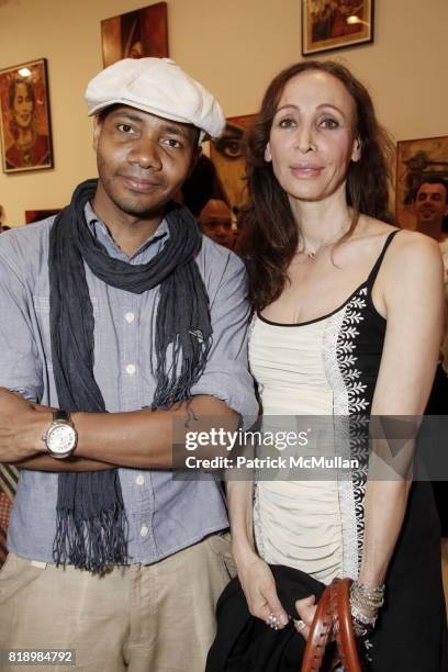 Spooky and Amy Guttman attend SHEPARD FAIREY "May Day" Exhibition Opening Reception at Deitch Projects on May 1, 2010 in New York.