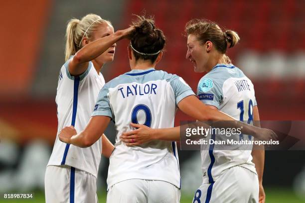 Jodie Taylor of England celebrates with Steph Houghton and Ellen White after scoring her hatrick and the teams fourth goal during the UEFA Women's...