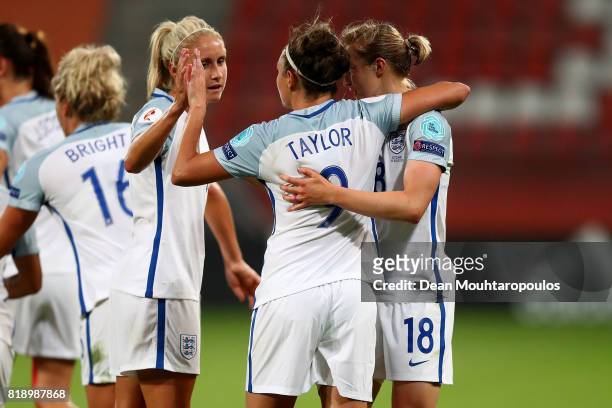 Jodie Taylor of England celebrates with Steph Houghton and Ellen White after scoring her hatrick and the teams fourth goal during the UEFA Women's...