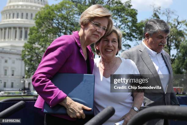 Sen. Elizabeth Warren joins American Federation of Teachers President Randi Weingarten and AFL-CIO President Richard Trumka during a rally against...