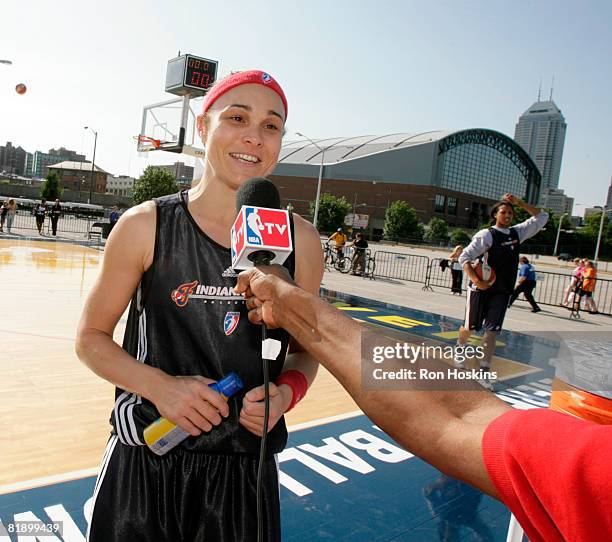 Tully Bevilaqua of the Indiana Fever speaks with the media prior to the Fever practicing outside near Conseco Fieldhouse July 10, 2008 in...