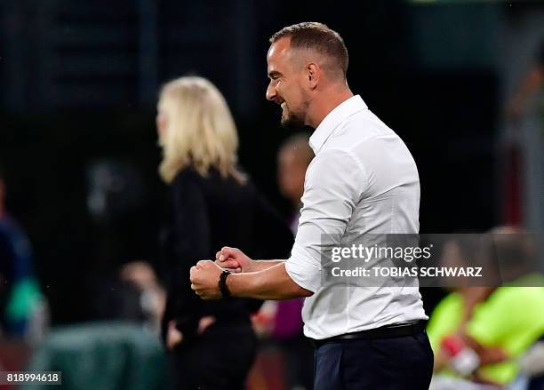 England's head coach Mark Sampson reacts after England scored during the UEFA Women's Euro 2017 football tournament match between England and...