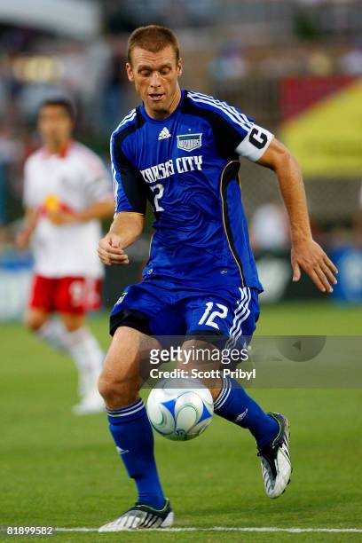 Jimmy Conrad of the Kansas City Wizards dribbles the ball against the New York Red Bulls at Community America Ballpark on July 10, 2008 in Kansas...