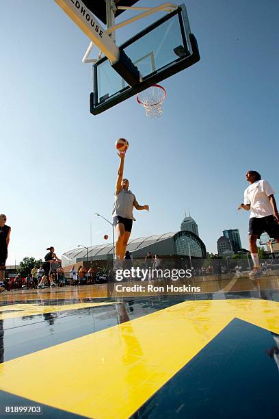 Allison Feaster of the Indiana Fever shoots a layup during the Fevers practice near Conseco Fieldhouse July 10, 2008 in Indianapolis, Indiana. They...