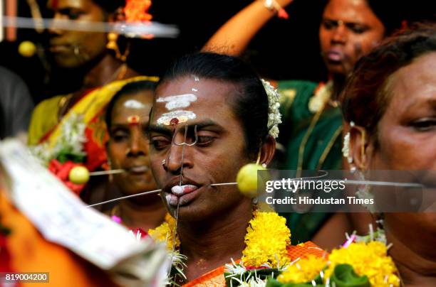 Religious Freaks - Eunuchs carrying out a ritual at a religious procession of Renukadevi at Antop Hill on Monday.