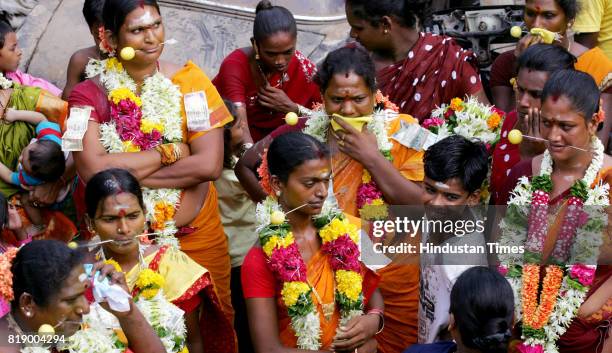 Religious Freaks - Eunuchs carrying out a ritual at a religious procession of Renukadevi at Antop Hill on Monday.