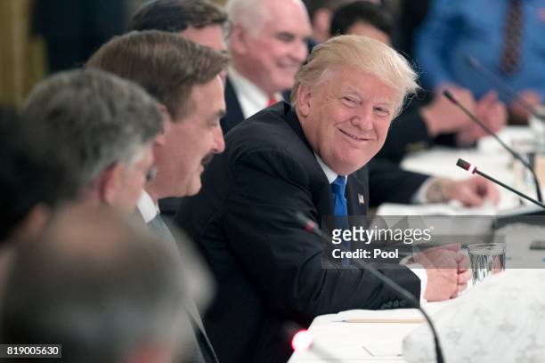 President Donald Trump attends a meeting with U.S. Company representatives and featuring products made in the United States, in the East Room of the...