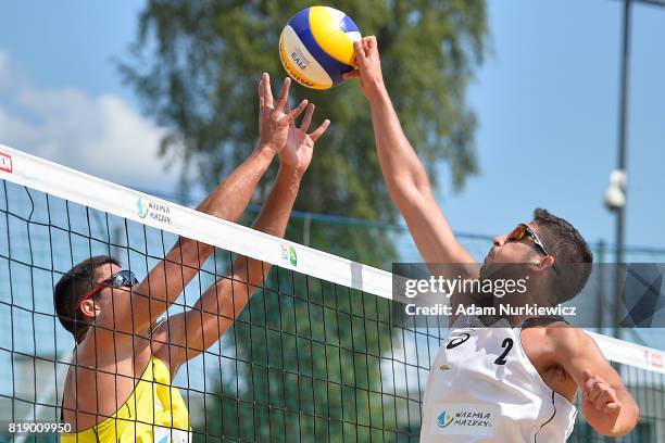 Felipe Humana-Paredes of Canada blocking Vitor Felipe of Brazil during FIVB Grand Tour - Olsztyn: Day 1 on July 19, 2017 in Olsztyn, Poland.