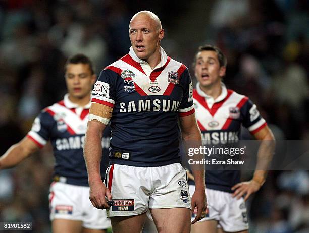 Craig Fitzgibbon of the Roosters watches a video referee review on the scoreboard during the round 18 NRL match between the Sydney Roosters and the...