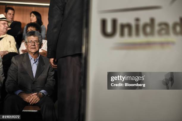 Lawmaker Henry Ramos Allup sits during a press conference held by the opposition coalition announcing the goals of a transitional government in...
