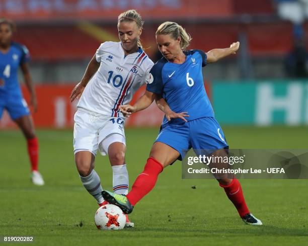 Dagny Brynjarsdottir of Iceland battles with Amandine Henry of France during the UEFA Women's Euro 2017 Group C match between France and Iceland at...