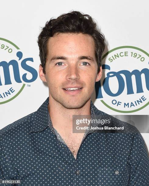 Pretty Little Liars" star Ian Harding shows off his pearly whites for a good cause at the Tom's of Maine Luminous White toothpaste launch benefiting...