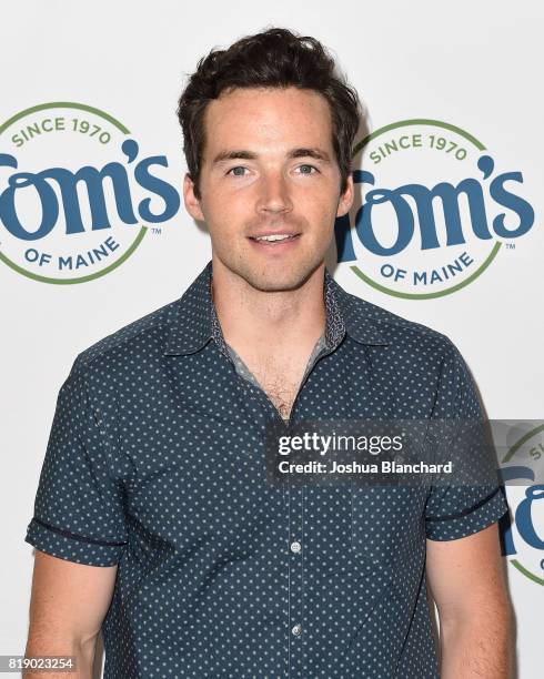 Pretty Little Liars" star Ian Harding shows off his pearly whites for a good cause at the Tom's of Maine Luminous White toothpaste launch benefiting...