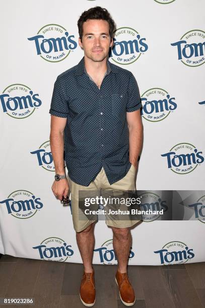 Pretty Little Liars" star Ian Harding shows off his pearly whites for a good cause at the Tom's of Maine Luminous White toothpaste launch benefiting...