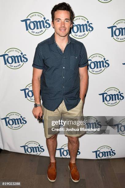 Pretty Little Liars" star Ian Harding shows off his pearly whites for a good cause at the Tom's of Maine Luminous White toothpaste launch benefiting...