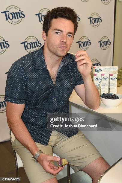 Ian Harding put his smile to the test with a blueberry donut to celebrate National Blueberry Month at Tom's of Maine Luminous White toothpaste launch...