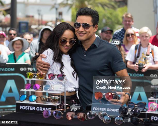 Kat Graham and Mario Lopez visit "Extra" at Universal Studios Hollywood on July 19, 2017 in Universal City, California.