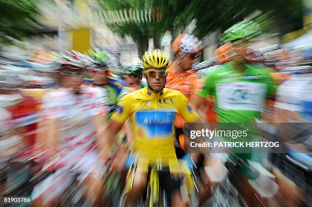 Overall leader's yellow jersey Luxembourger team leader Kim Kirchen next to the best sprinter green jersey Norwegian Thor Hushovd and The best...