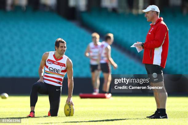 Josh Kennedy talks with coach John Longmire during a Sydney Swans AFL training session at Sydney Cricket Ground on July 20, 2017 in Sydney, Australia.