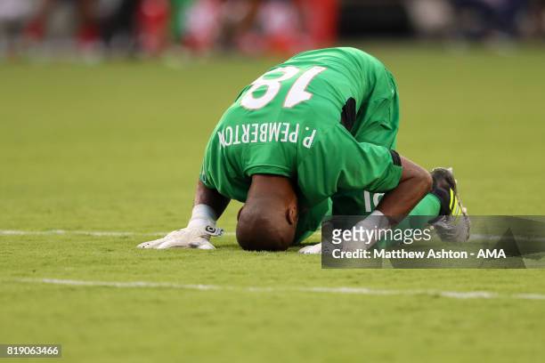 Goalkeeper Patrick Pemberton of Costa Rica kisses the ground as he celebrates after his team scored a goal to make it 1-0 during the 2017 CONCACAF...
