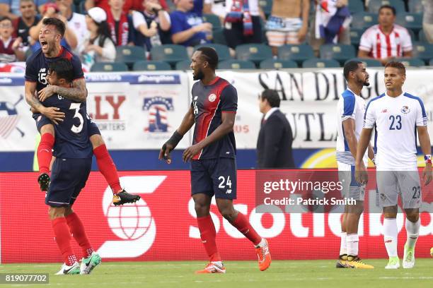 Francisco Calvo and Giancarlo Gonzalez of Costa Rica celebrate an own-goal by Panama in the second half during the 2017 CONCACAF Gold Cup...