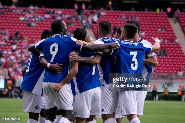 Vincent Aboubakar of Porto celebrates with his teammates after scoring the firts goal of his team during a the friendly match between Chivas and...