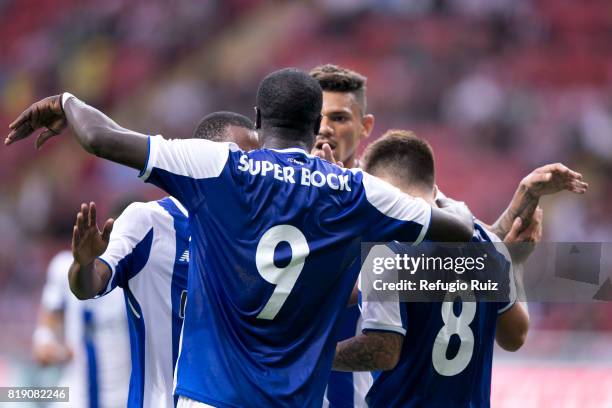 Otavio Monteiro of Porto celebrates with teammates after scoring the second goal of his team during the friendly match between Chivas and Porto at...