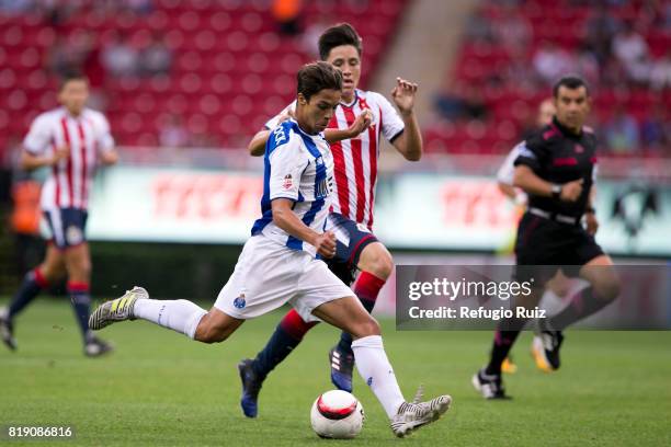 Carlos Zamora of Chivas fights for the ball with Otavio Monteiro of Porto during the friendly match between Chivas and Porto at Chivas Stadium on...