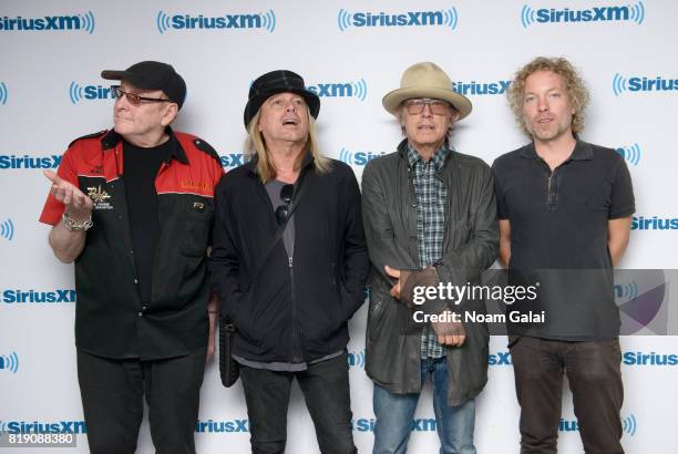 Rick Nielsen, Robin Zander, Tom Petersson and Daxx Nielsen of Cheap Trick visit SiriusXM Studios on July 19, 2017 in New York City.