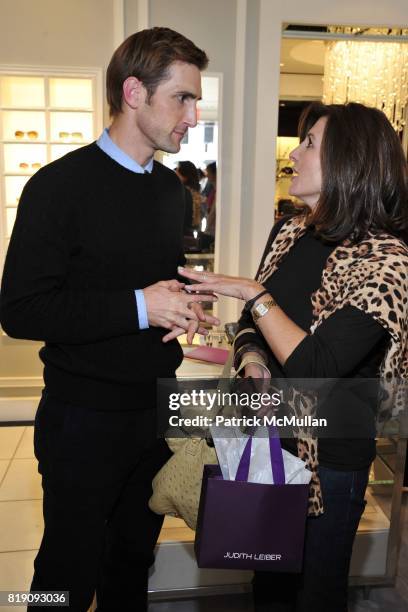 Christopher Gavigan and Polly Baril attend JUDITH LEIBER "Take Home a Handbag" Store Event to benefit Healthy Child Healthy World at Judith Leiber on...